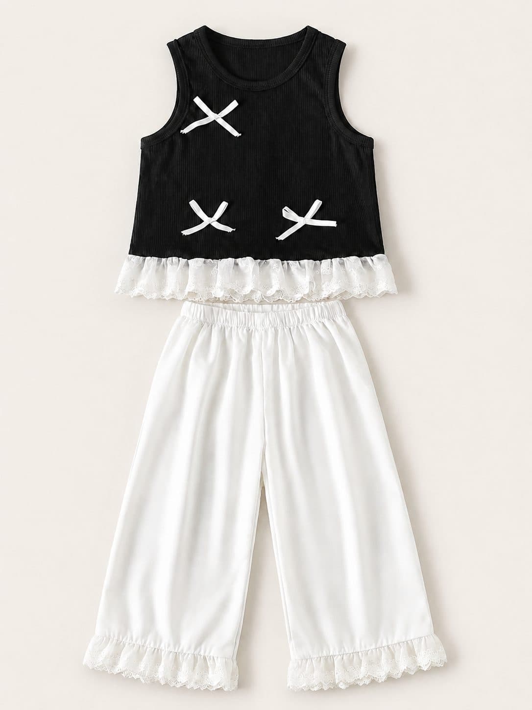 CONJUNTO TOP NEGRO CON LAZOS Y PANTALÓN BLANCO CON ENCAJE — conjunto para niña