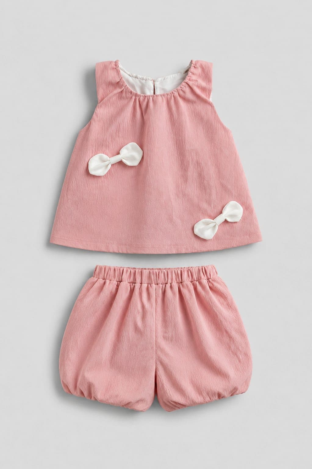 CONJUNTO ROSADO CON LAZOS — conjunto para niña