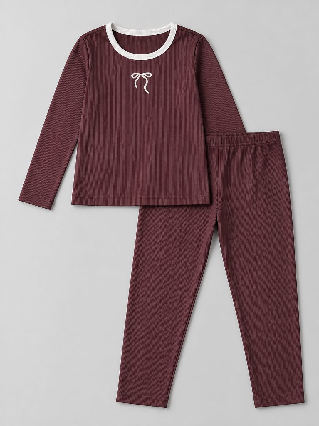 PIJAMA TEJIDA COLOR VINO CON MOÑO — conjunto para niña