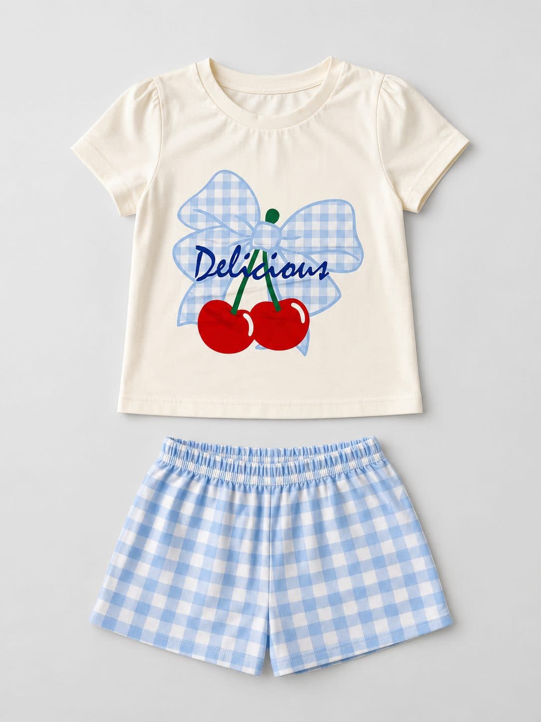 CONJUNTO POLO CEREZAS Y SHORT A CUADROS CELESTE — conjunto para niña