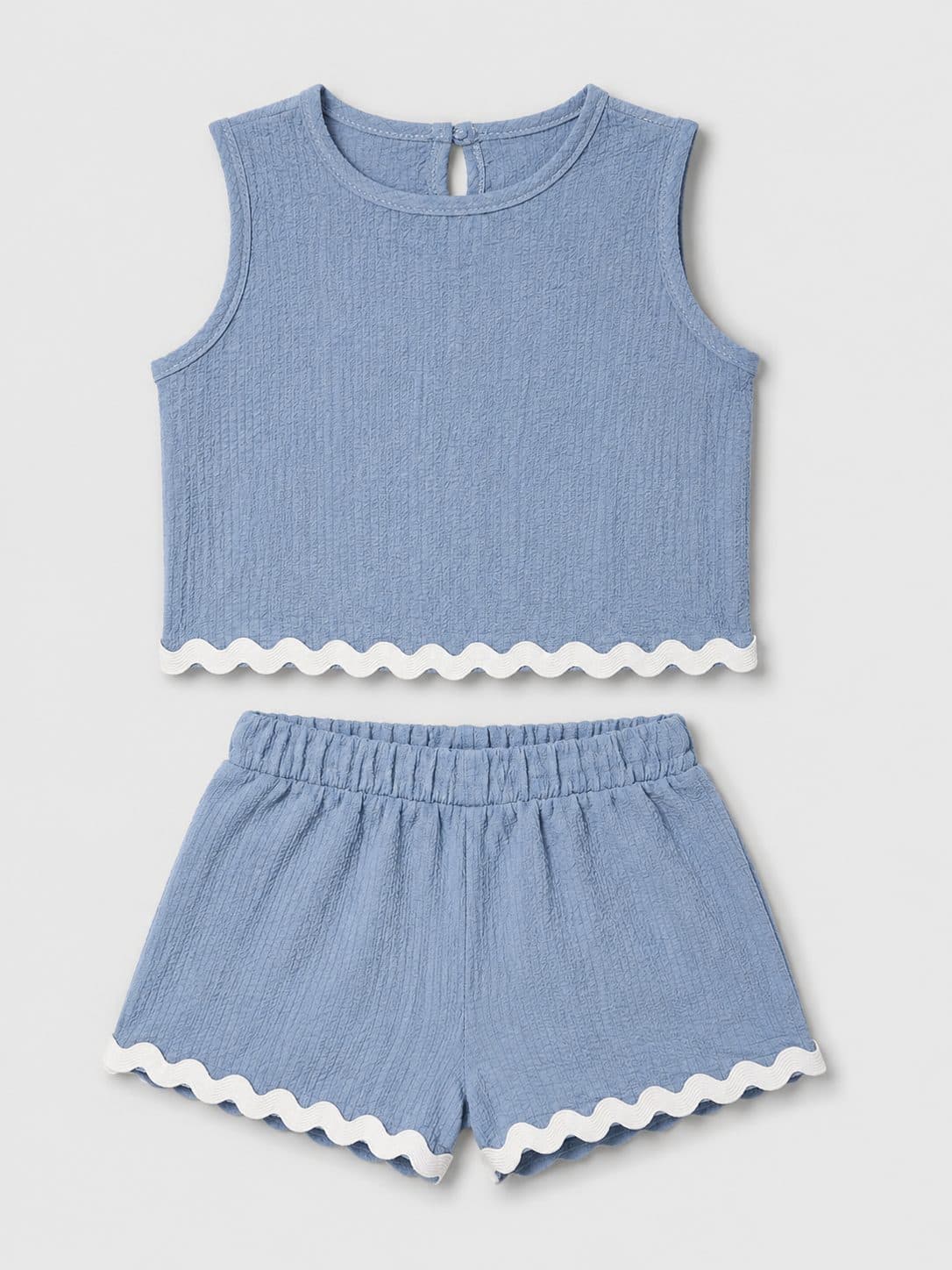 CONJUNTO TOP Y SHORT CELESTE CON RIBETE ONDULADO — conjunto para niña