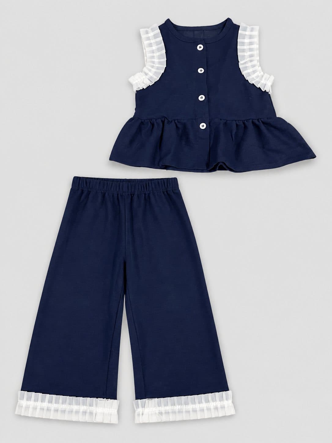 CONJUNTO BLUSA AZUL MARINO CON VOLANTES Y PANTALÓN — conjunto para niña