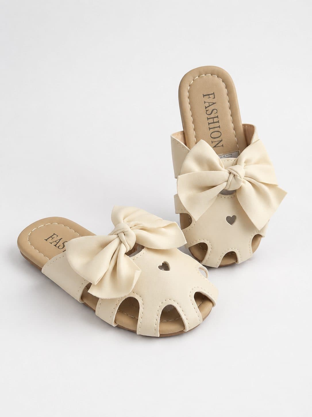 SANDALIAS TIPO MULE CREMA CON MOÑO — zapatos para niña