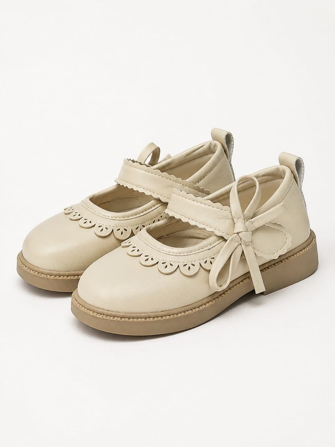 BALLERINAS BEIGE CON RIBETE CALADO Y LAZO — zapatos para niña