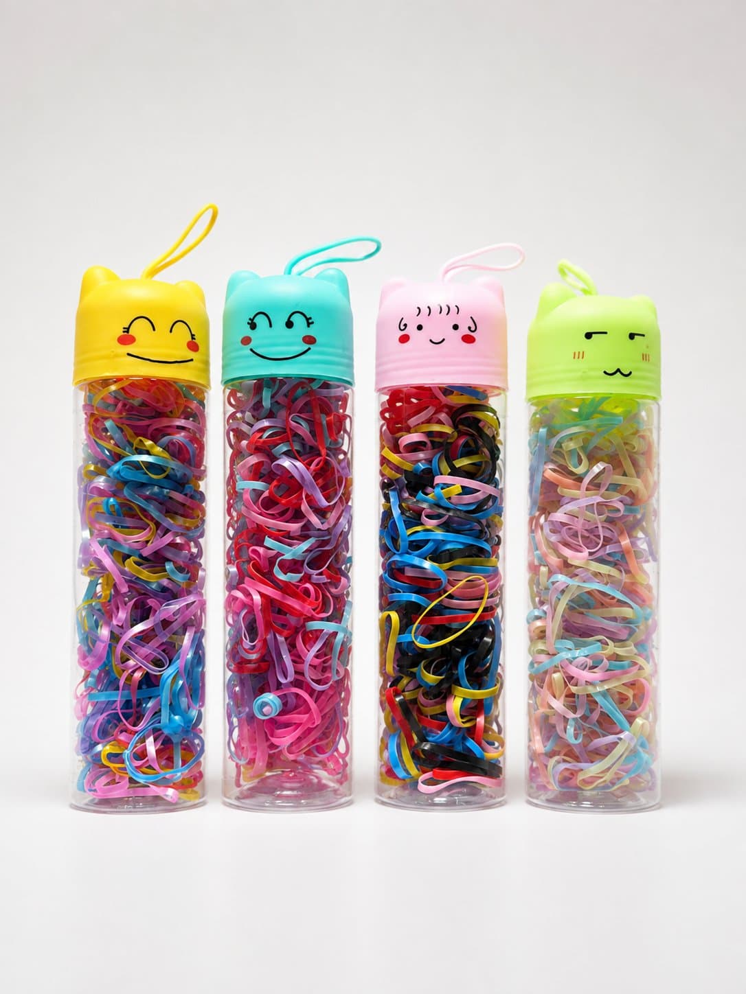 LIGAS DE CABELLO EN TUBO CARITA DE GATO (4 COLORES) — accesorio para niña