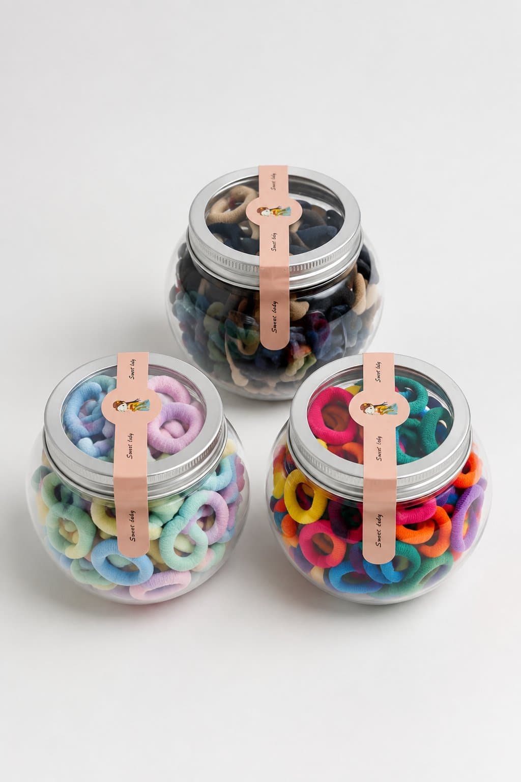 LIGAS DE CABELLO EN FRASCO SWEET LADY (3 COLORES) — accesorio para niña