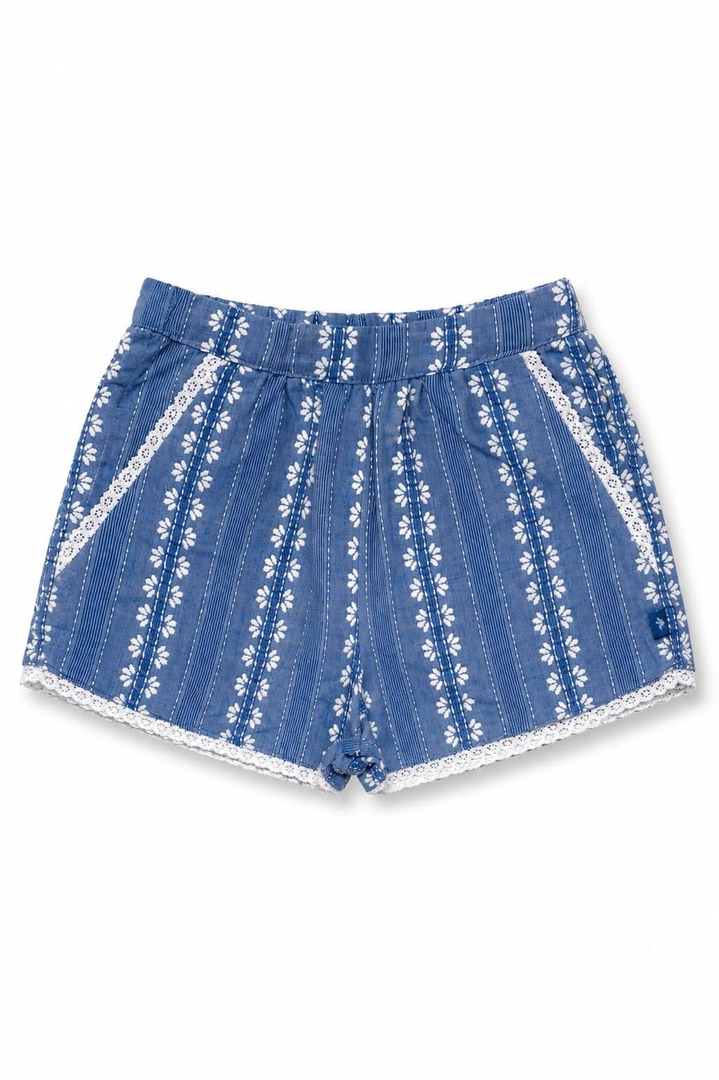 SHORT AZUL CON ESTAMPADO DE MARGARITAS Y RIBETE CROCHET — pantalón para niña