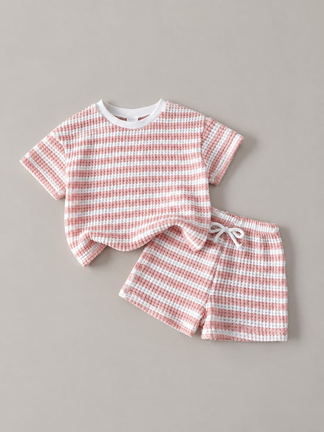 CONJUNTO A RAYAS ROSA Y BLANCO TEXTURA WAFFLE — conjunto para niña