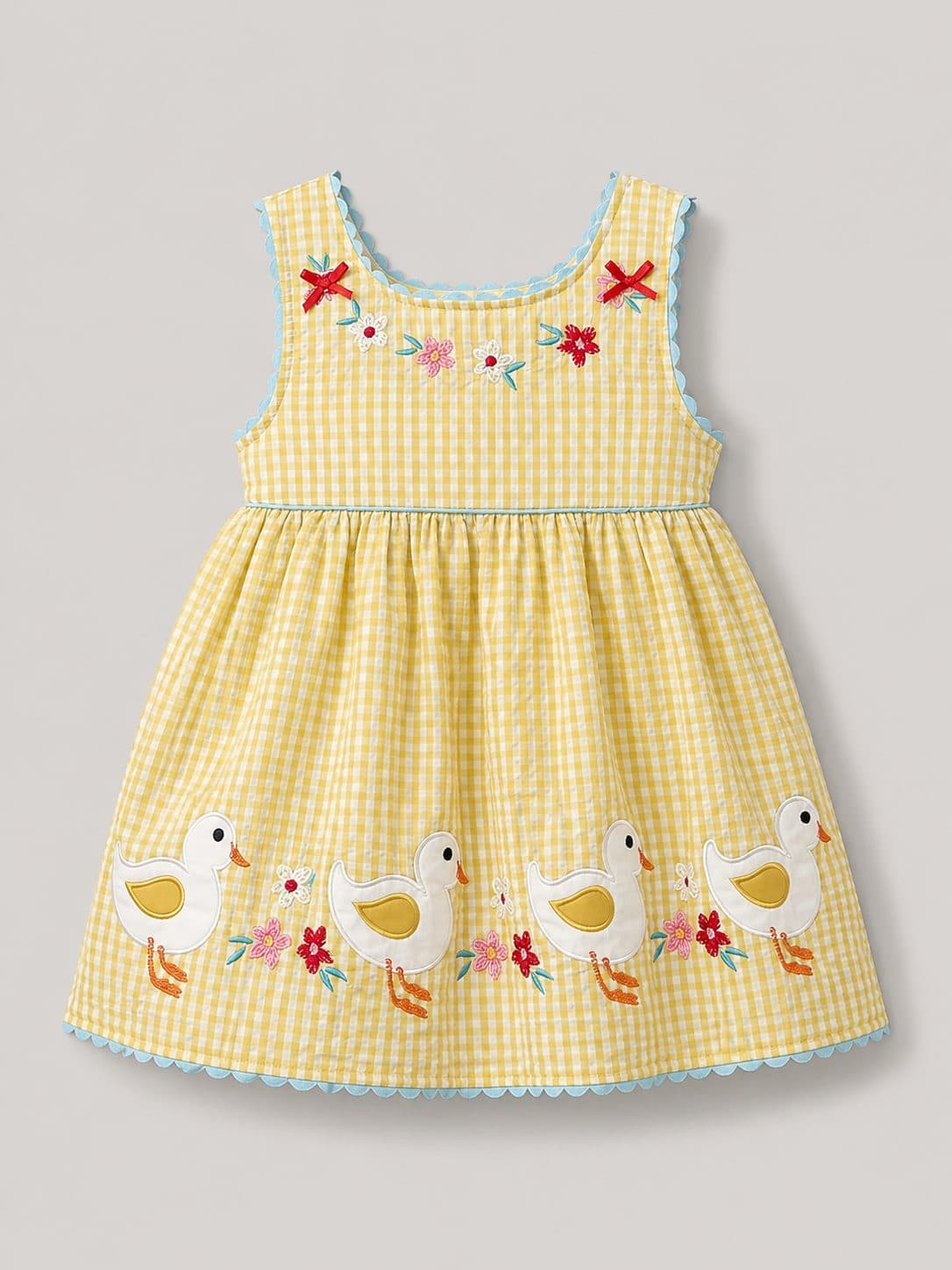 VESTIDO AMARILLO A CUADROS CON PATITOS BORDADOS — vestido para niña