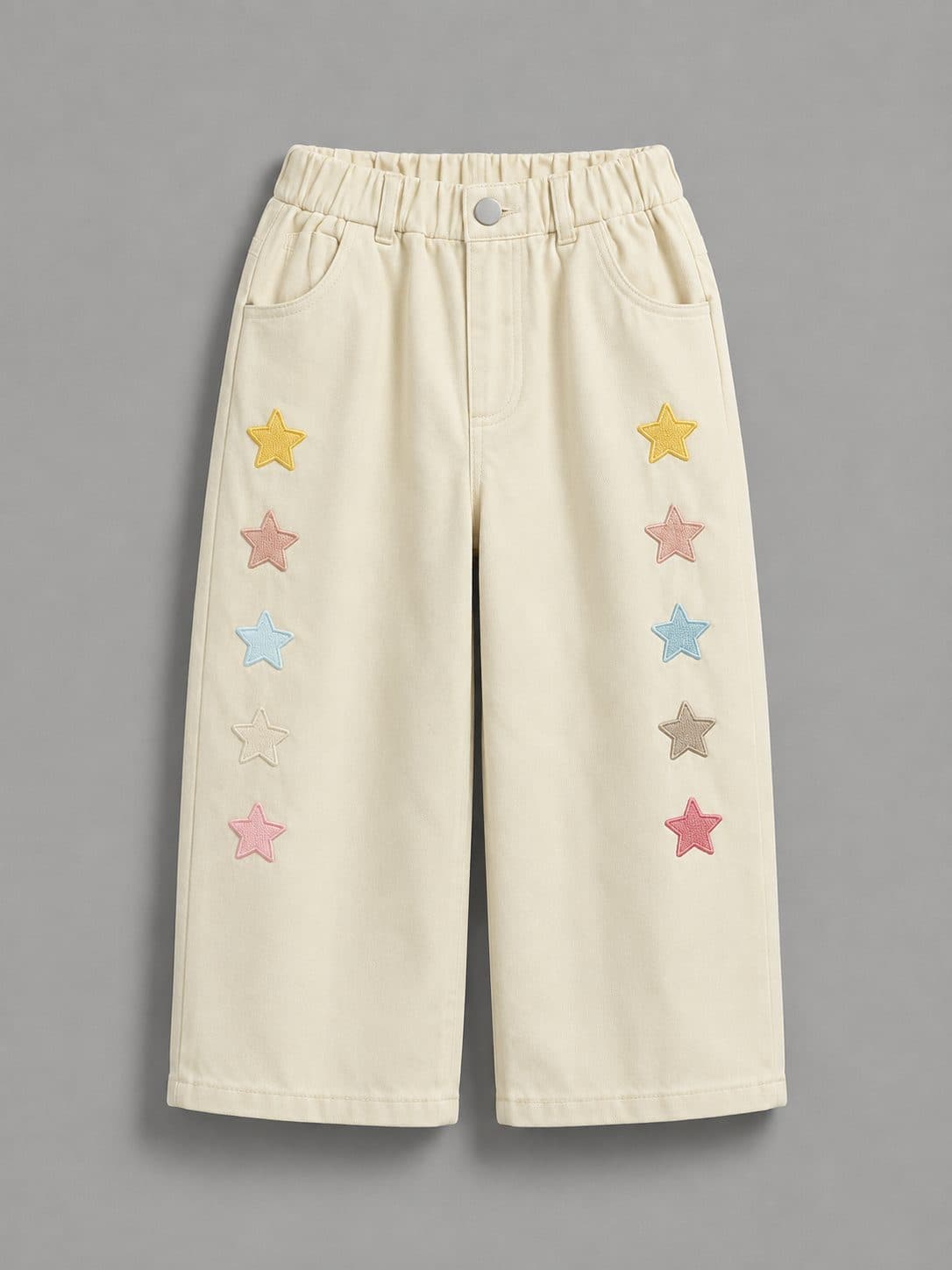 PANTALÓN CREMA CON ESTRELLAS DE COLORES — pantalón para niña