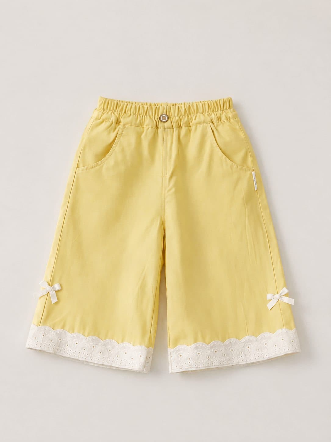 PANTALON AMARILLO CON ENCAJE Y MOÑOS — pantalón para niña