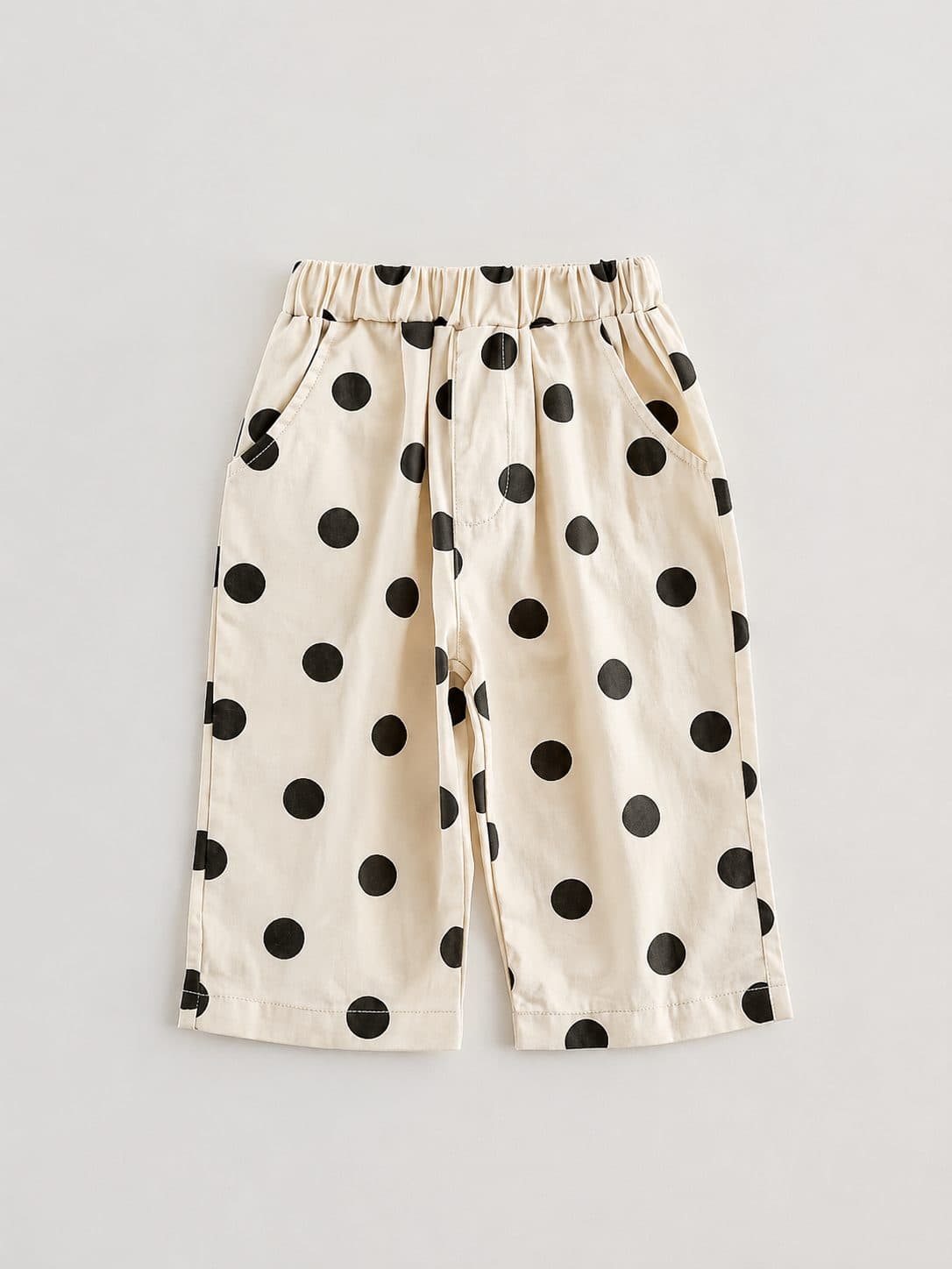 PANTALÓN CREMA CON LUNARES NEGROS — pantalón para niña
