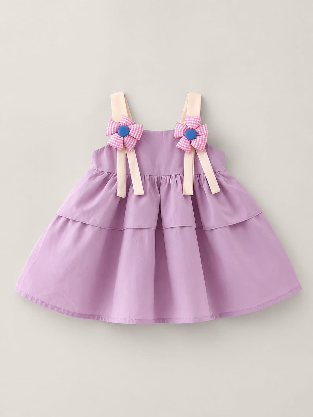 VESTIDO LILA CON FALDA EN CAPAS Y LAZOS — vestido para niña
