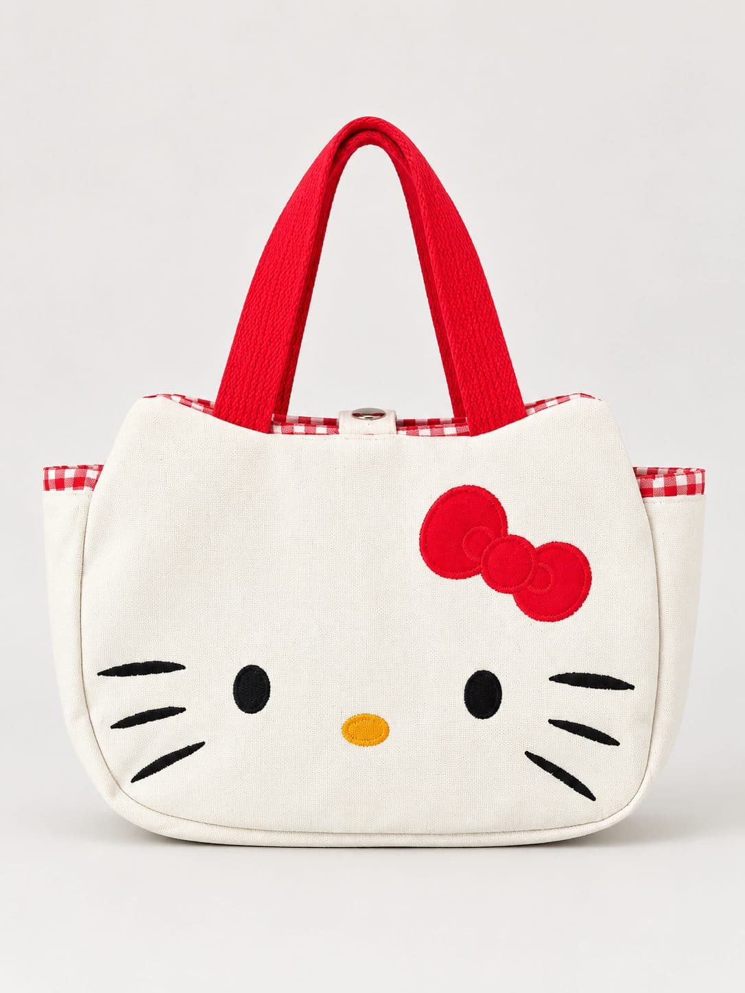 CARTERA BLANCA HELLO KITTY CON LAZO ROJO — accesorio para niña